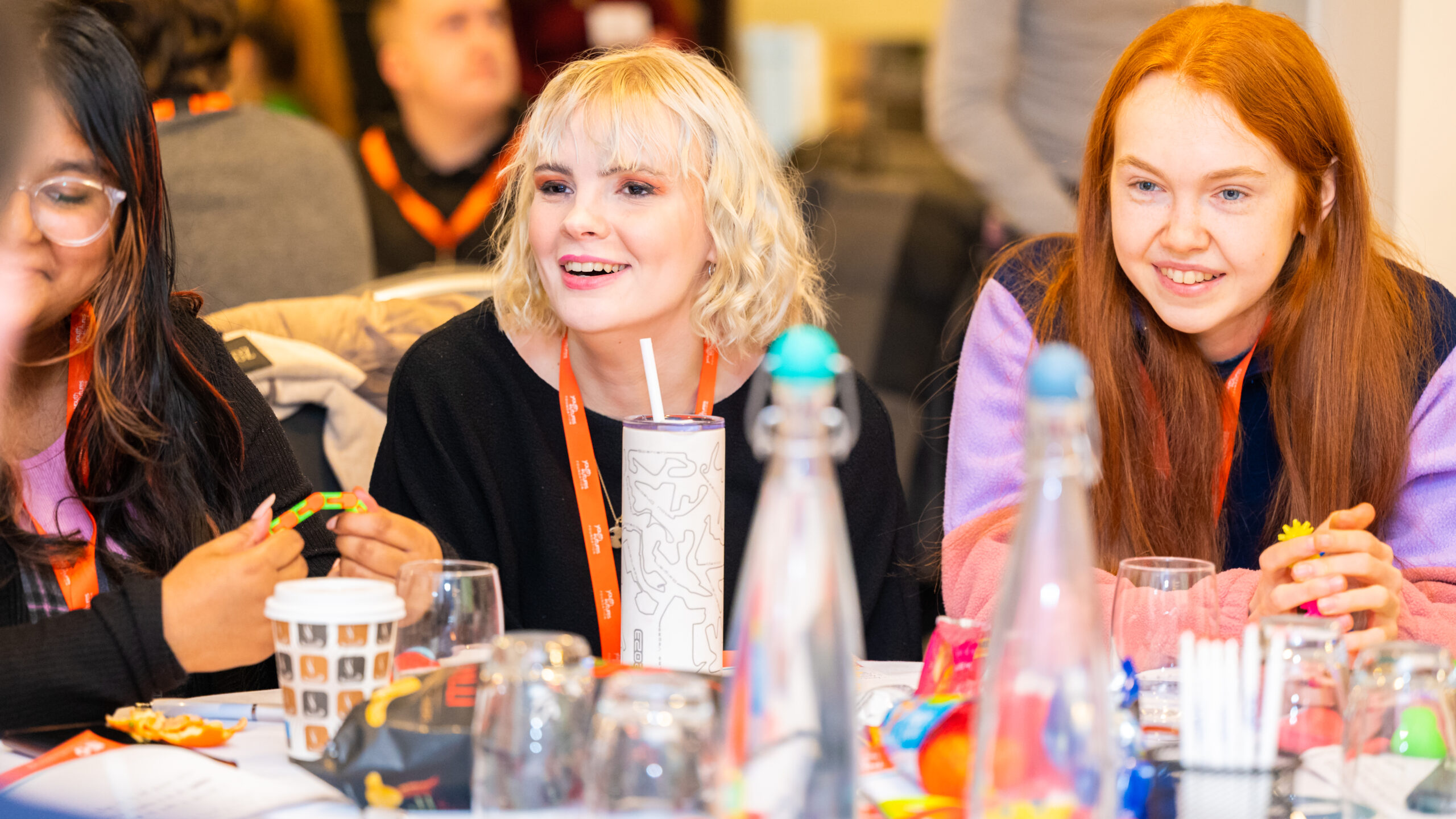 Smiling group of three young people at a Youth Futures event